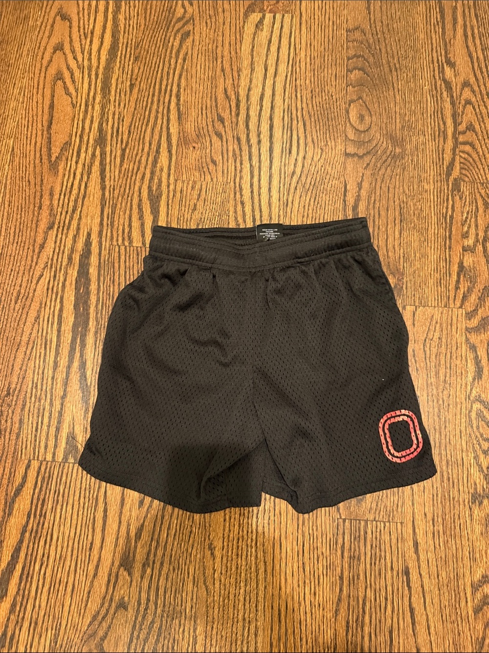 Kids Black Athletic Mesh Shorts with Red Accent
